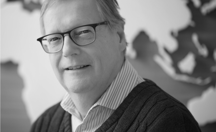 Close-up photo of Malcolm Ross, an advisor with over 40 years of expeirence coaching C-level executives in the telecom indsutry