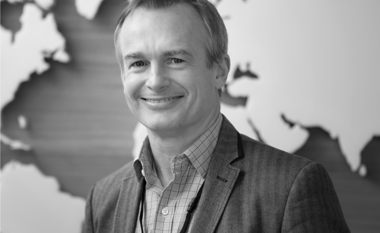 Close-up photo of Stanislav Kura, a top-level executive with 25 years of experience in board-level top executive positions